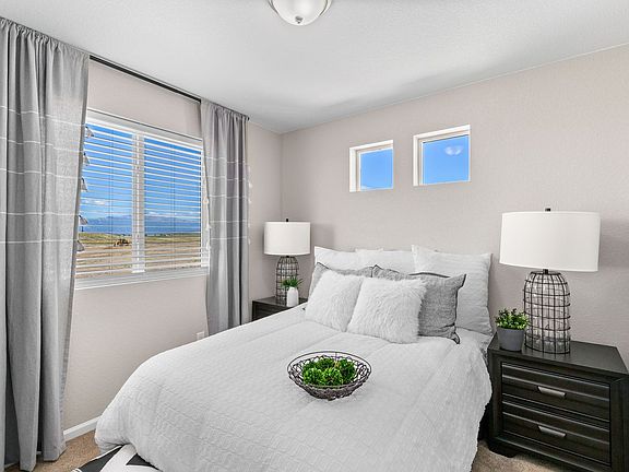 A view of the 2nd bedroom and windows
