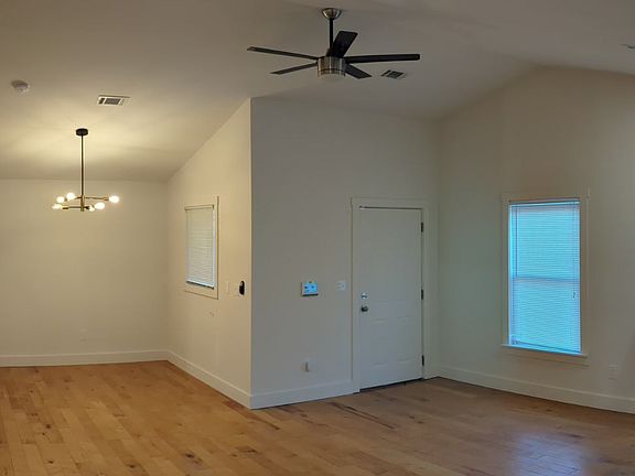 Door on right is back entrance into living area.