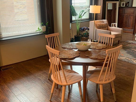 Large windows and hardwood floors