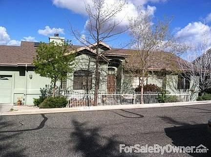 Front of house before trees blossomed