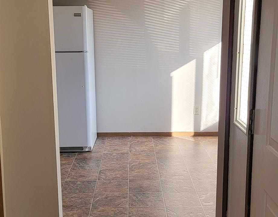 Dining area in the kitchen. This is a little shoe area off the front door.