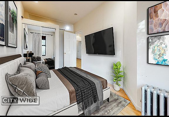 2nd image of 545 E 12th St APT 1A