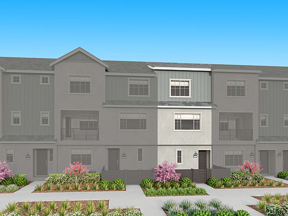 The image depicts a multi-story residential building with a gray exterior, surrounded by landscaped