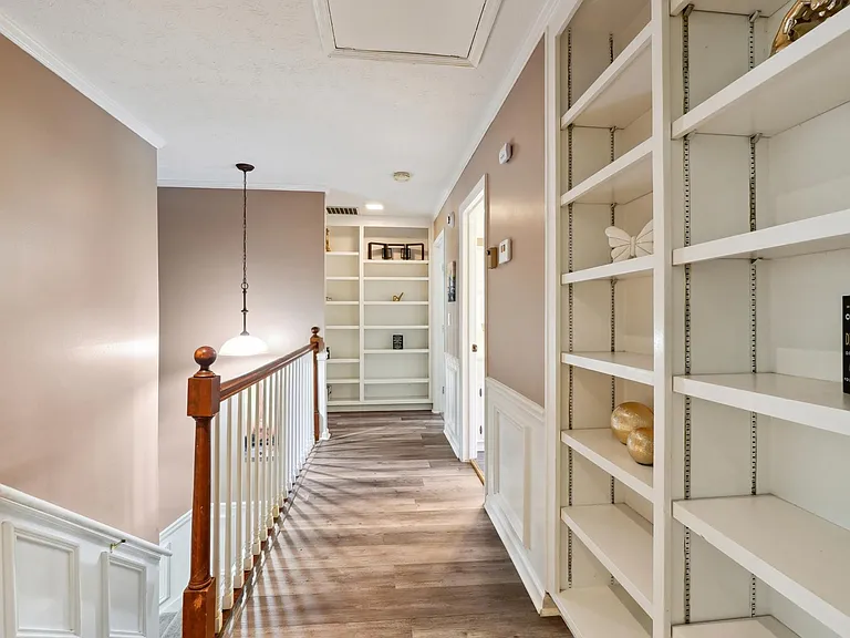 Upstairs Hallway with staircase to Main Level Foyer