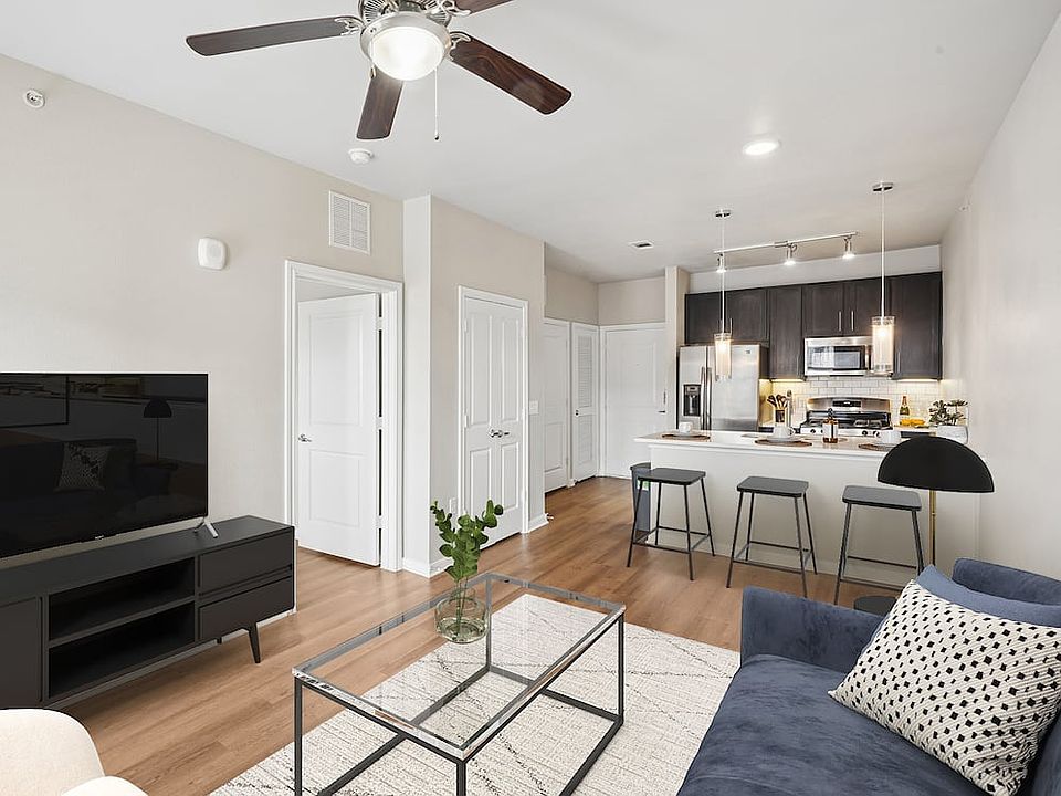 Kitchen and living room with hard surface flooring