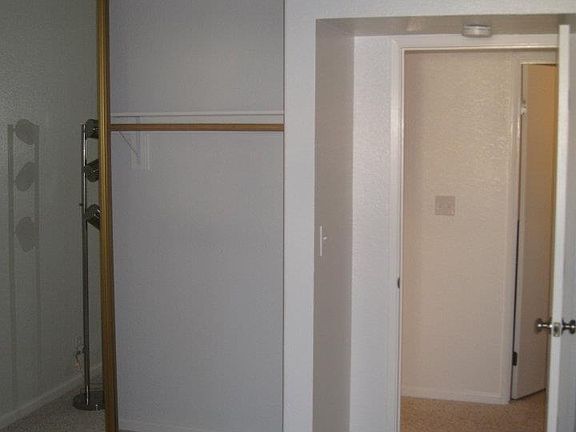 Smaller Bedroom (floors have since been replaced)