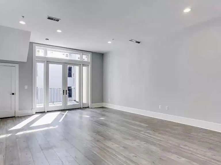 Main living area facing balcony