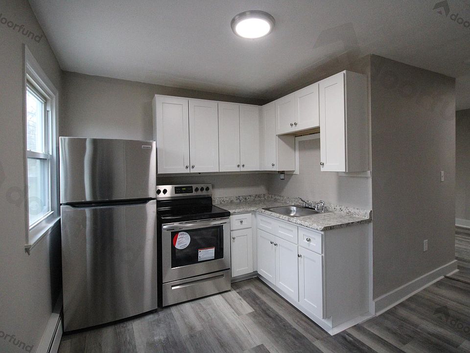 New stainless-steel appliances, flooring and cabinets in the kitchen