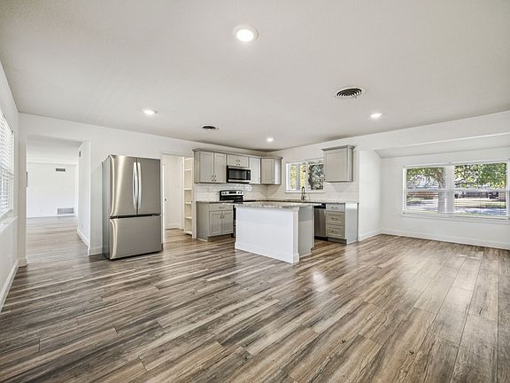 Large kitchen and dining area