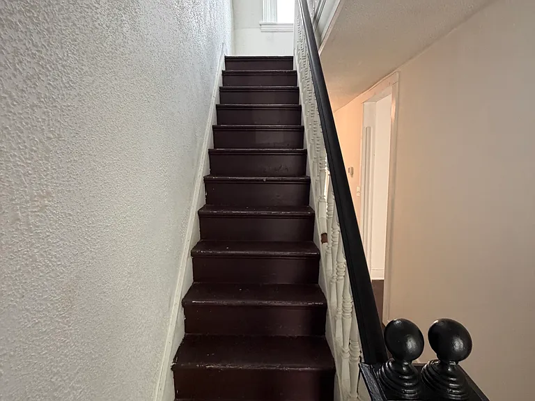 Stairs to other 2 BR's
