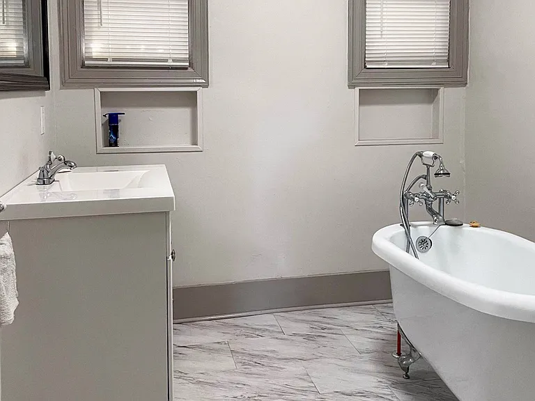 Enjoy a nice soak after a long day on the go in a stunning old school Victorian tub!
