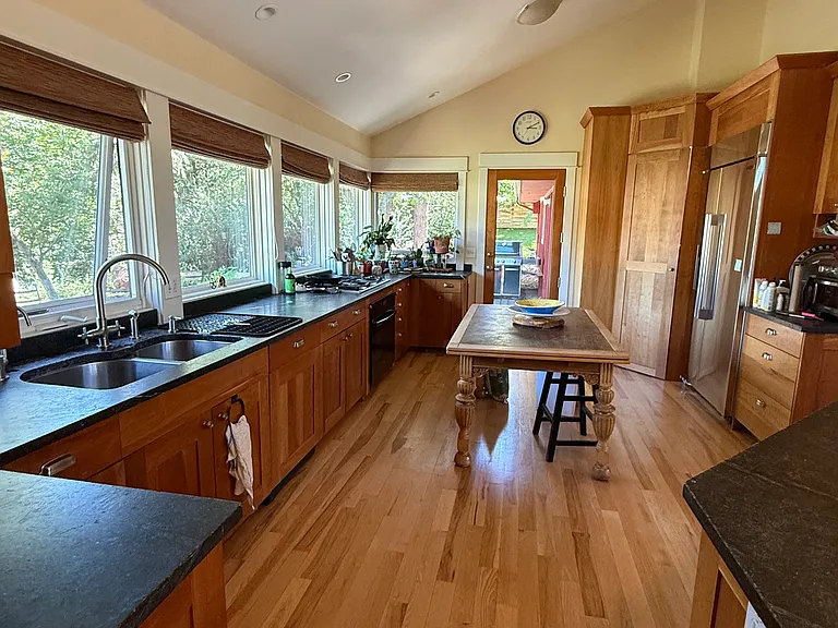 Kitchen and door out to backyard.