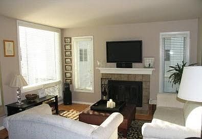 Open living room with wood burning fireplace!