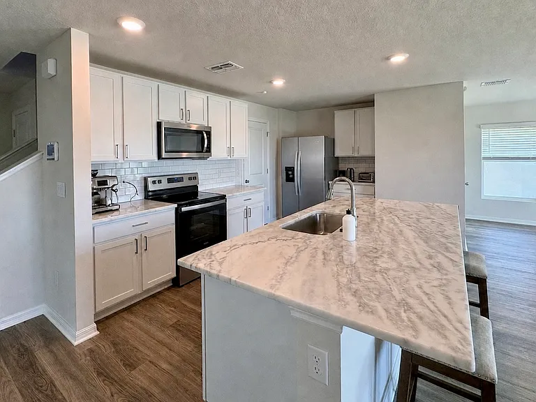 Upgraded kitchen - backsplash tiles and purified water