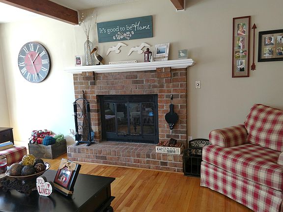 Wood burning fireplace in living room