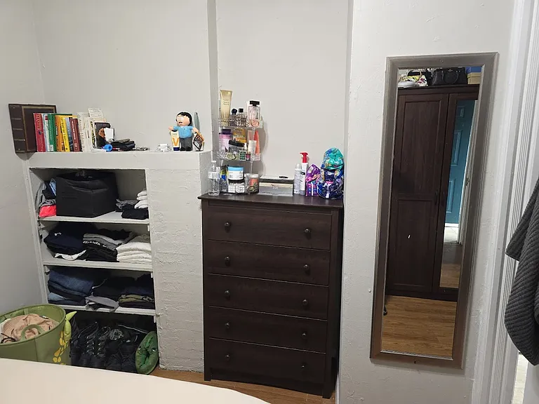 Bedroom with built-in shelves