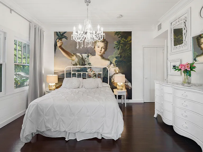 Master bedroom surrounded by lush green