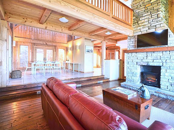 living room with fireplace, 50-inch TV