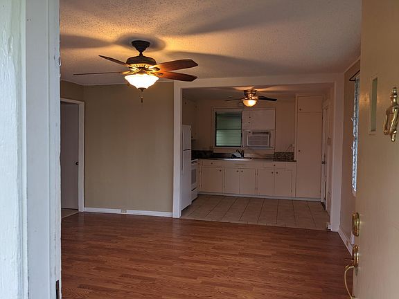 View into Living Room and Kitchen from Front Door