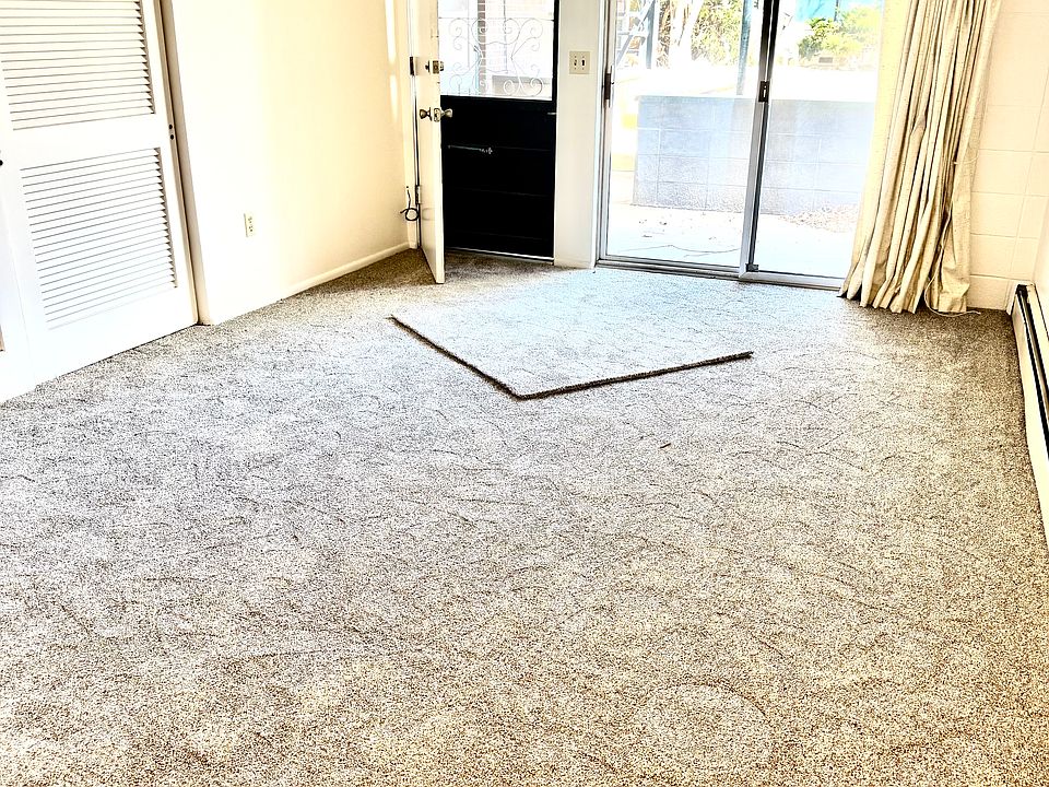Living room and exit to patio.
