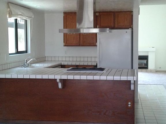 Kitchen with breakfast nook and dining room