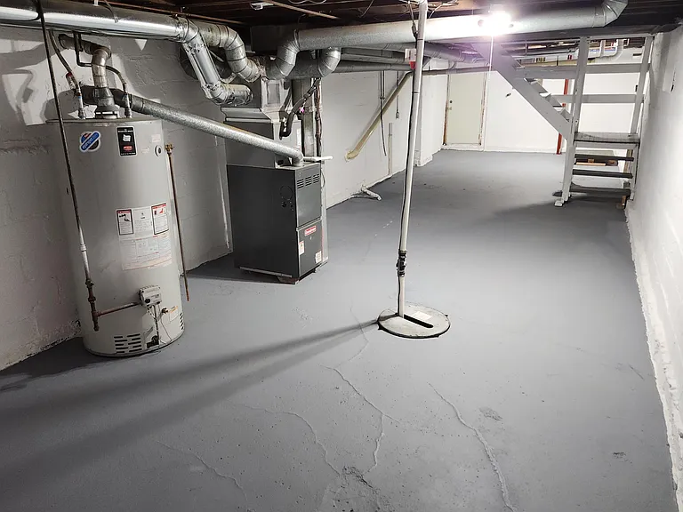 Newly waterproofed & sealed basement with washer/dryer hookup