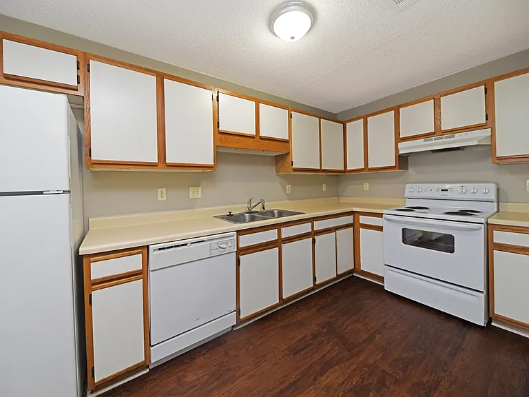 Kitchen area with ample cabinetry & counter space