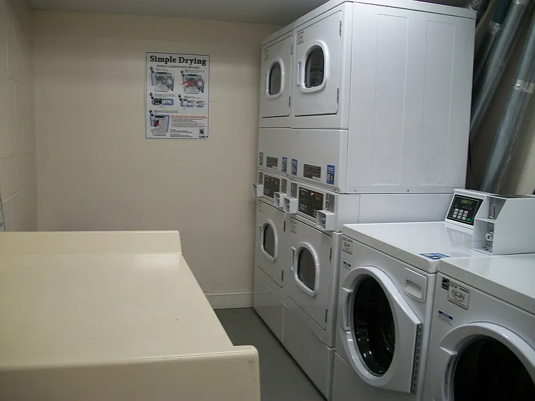 Shared laundry room in basement.