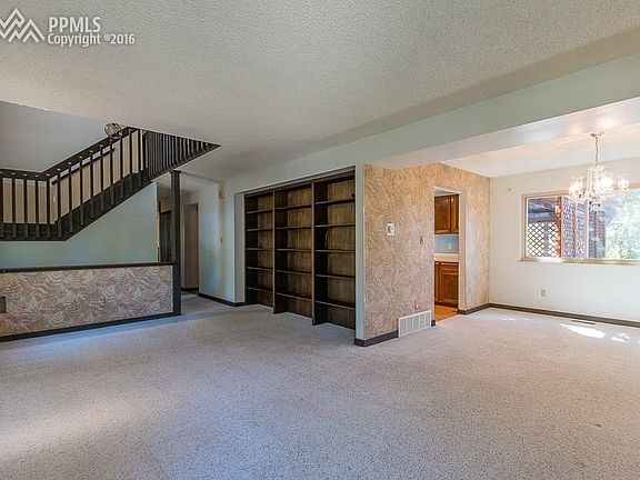 Formal living room opens to dining room