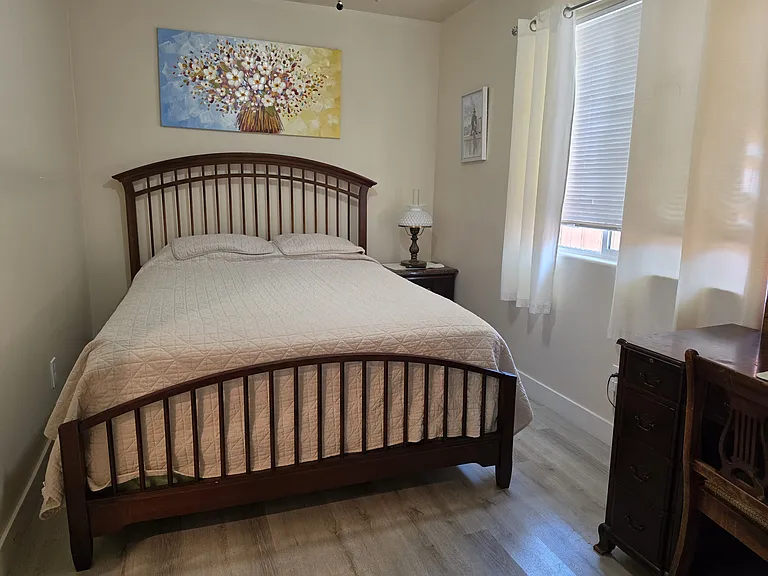 Second Bedroom with closet and ceiling fan.