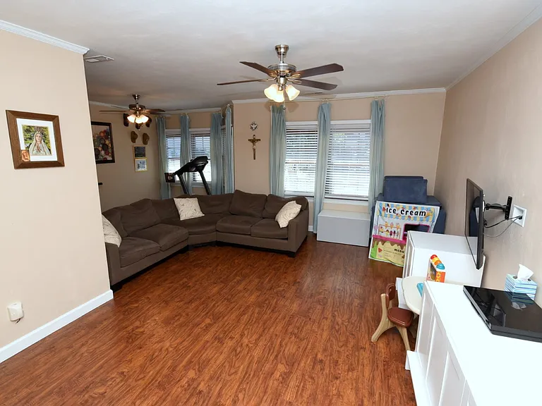 Formal dining and living area off kitchen,or versatile space.