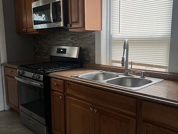 2nd image of 10153 S Eberhart Ave #2