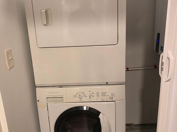 Washer drier in unit off of Bathroom.