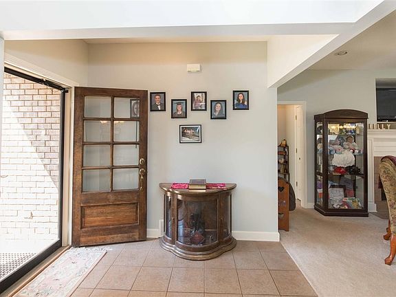 Bright foyer welcomes your guests to your home.