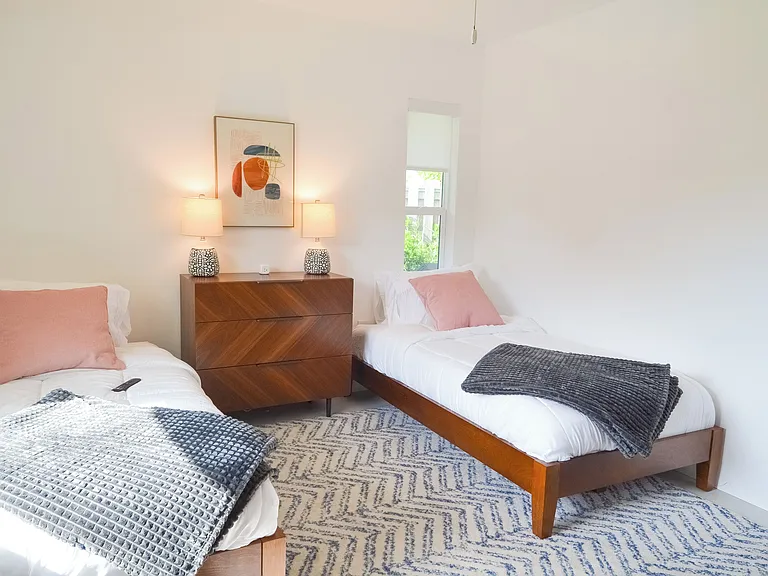 Third bedroom, two win beds, dresser, smart TV and closet
