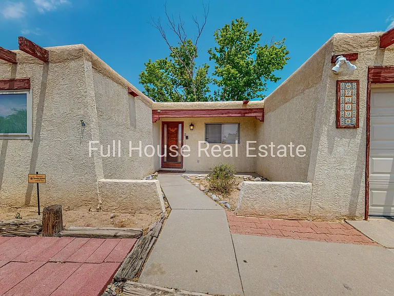 7309 Coulson Dr NE — Photo 2