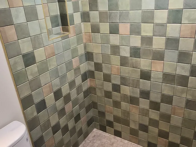 shown before installation of shower doors