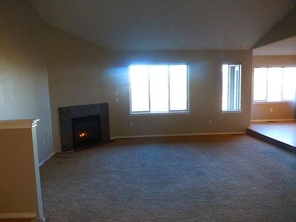 Spacious living room with views and new carpet!!