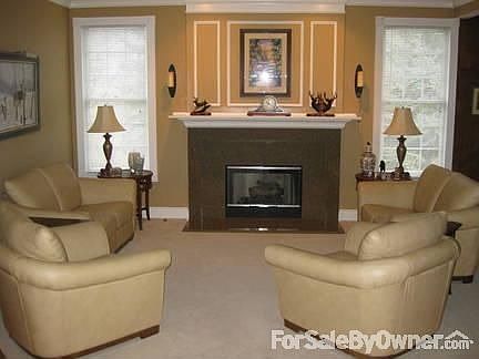 Living Room
						:
						Custom Granite gas fireplace, speakers,Crown/Window molding. Custom 6"base.