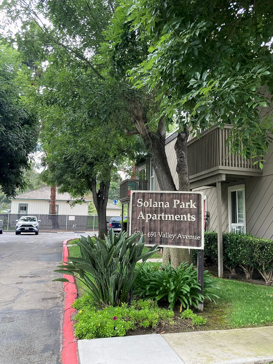 Front entry sign at Solana Park Apartments in Solana Beach, California. - 679 Valley Ave