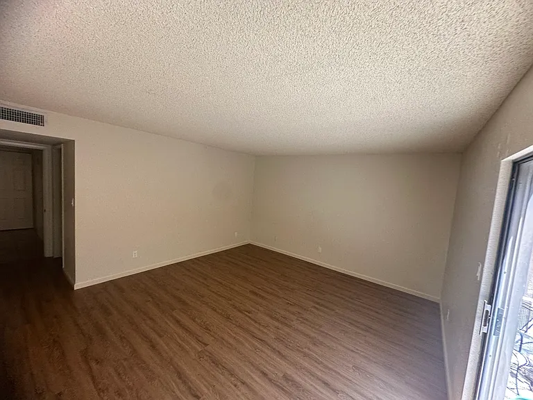 Primary bedroom from sliding patio door