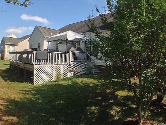 5th image of 10316 Woodman Hills Ter
