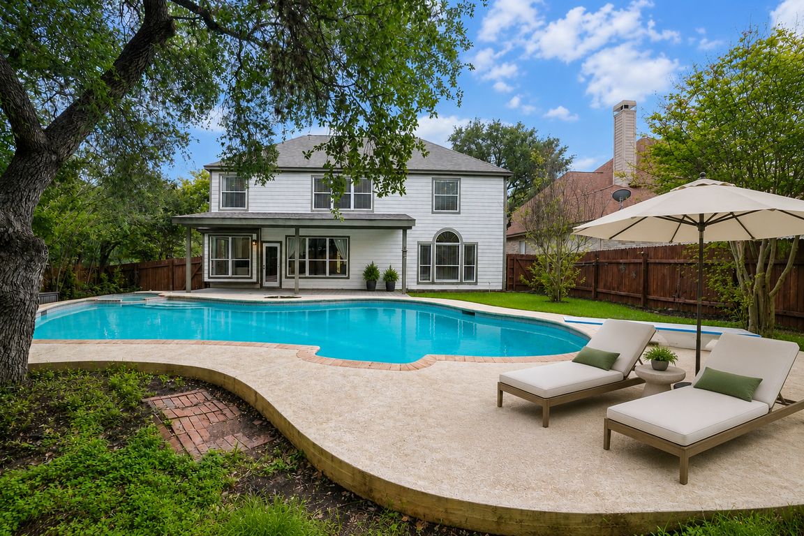 Peaceful suburban backyard with pool