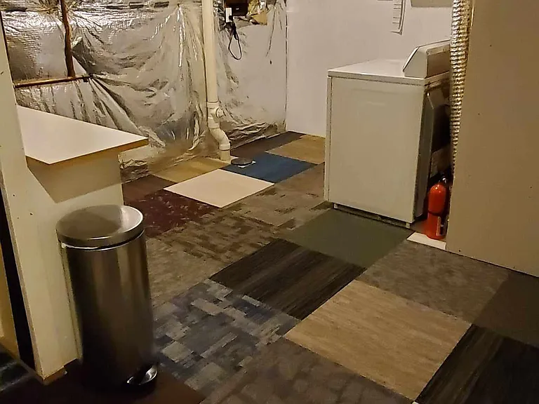 unfinished storage/laundry