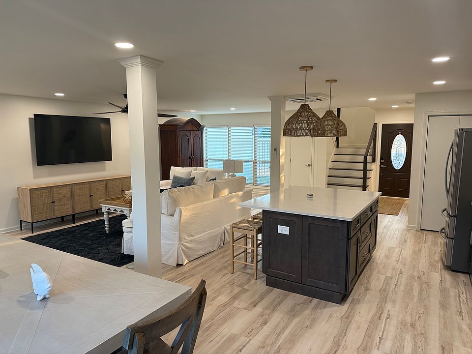 View from Kitchen into the Living Area near Glass Sliders