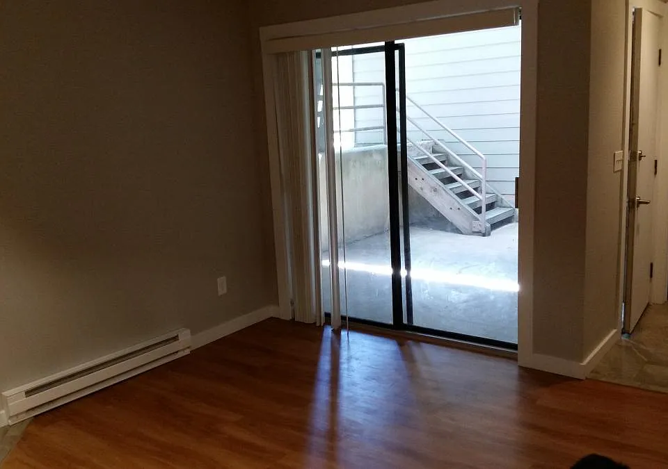 Living room sliding glass door to front patio