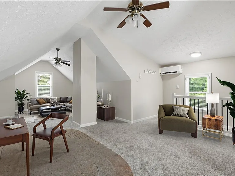 2nd floor bedroom. New carpet, new windows, new window blinds, new window trim. Split system HVAC.