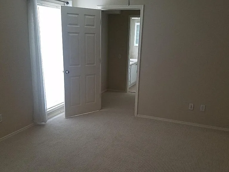 Master bedroom looking into dressing area