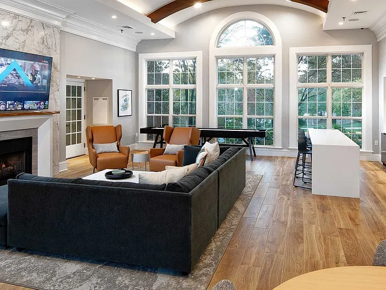 Lounge with fireplace and seating