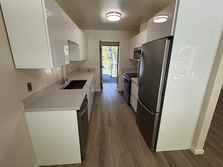 Kitchen facing entrance.